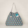 Bolso shopper grande Alda Jacquard turquesa y ocre