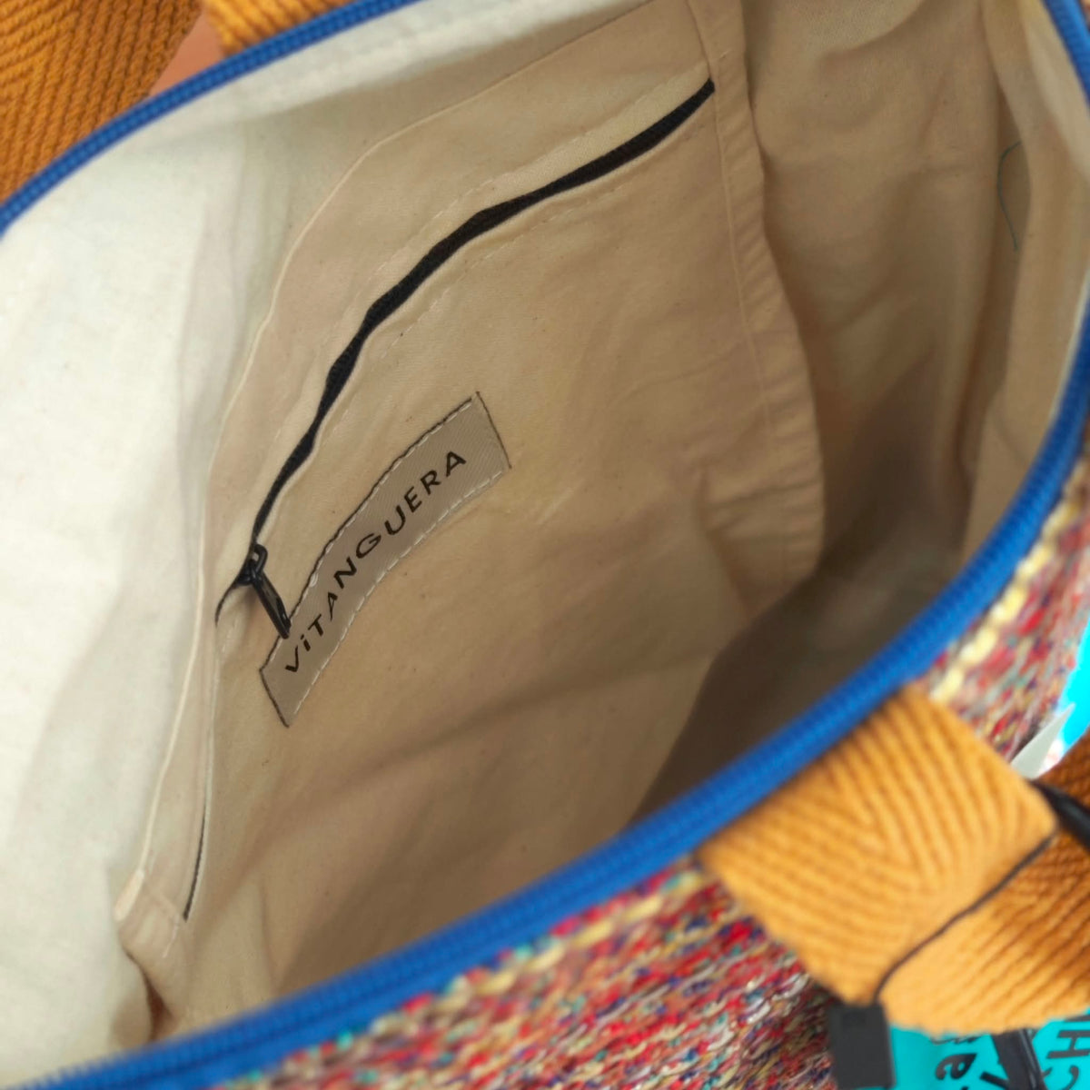 Mochila Vera «Tapicero oro con bajo azul»